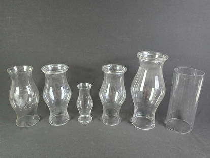 6 Glass Shades incl Williamsburg: NOT ELIGIBLE FOR IN-HOUSE SHIPPING. One with eagle etched shade. 9-1/2" to 17-1/2" high. Cylindrical shade with some chips to edges.