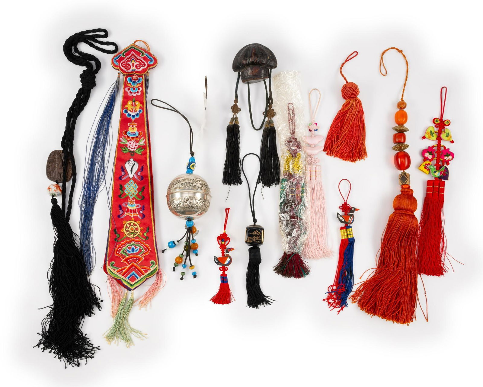 12 Asian Inspired Design Tassel Pcs: DESCRIPTION: Variety different tassels MEASUREMENTS: From 7-1/2'' to 32-1/2'' long CONDITION: Minor wear on some of them consistent of usage and age.