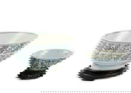 Two Qing Dynasty Porcelain Bowls: DESCRIPTION: Includes large porcelain rice bowl decorated with Sanskrit symbols with a wooden stand; and a smaller porcelain rice bowl decorated with floral designs and three symbols of happiness with