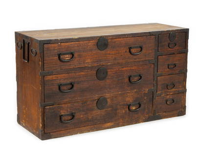 Japanese Tansu Chest: NOT ELIGIBLE FOR IN-HOUSE SHIPPING. DESCRIPTION: A mobile storage cabinet. Tansu originated during the Edo period (1603-1868), a time of economic growth and a rising merchant class in Japan. MEASUREME