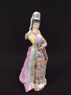 Meissen Figurine of a Woman: 3" wide X 3" deep X 7-1/2" high.