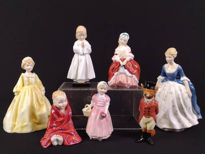 7 Royal Doulton Figurines: 4" to 7-3/4" high.