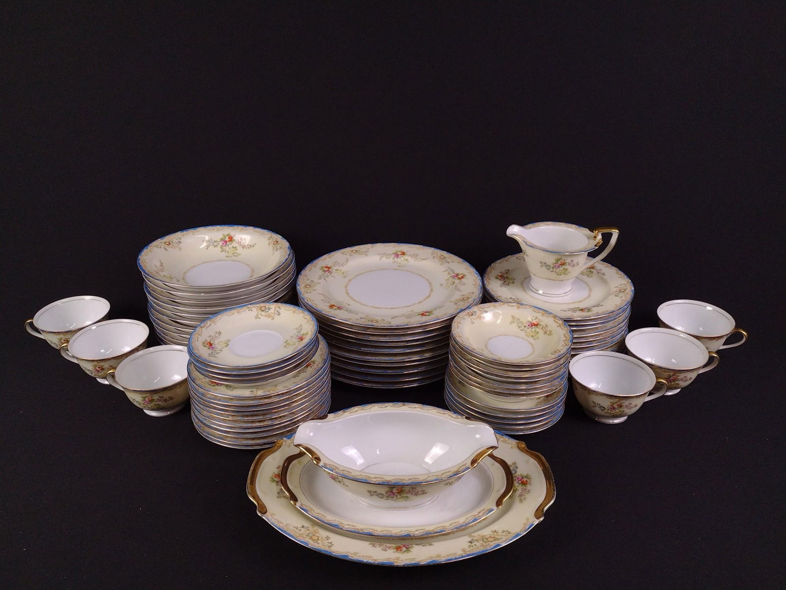 66 Pcs Empress China Dinnerware: dinner plate 9-3/4" diameter.