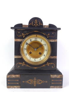 Vintage Mantel Clock: 8-1/4" wide X 5-1/4" deep X 10-1/2" high. Has some areas of discoloration. Working.