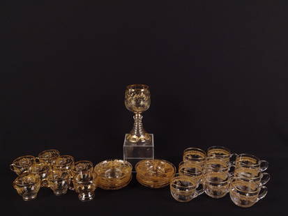 28 Pcs Moser Gold Painted Glassware: 2-3/4" to 3-1/2" diameter X 1" to 7-1/4" high.
