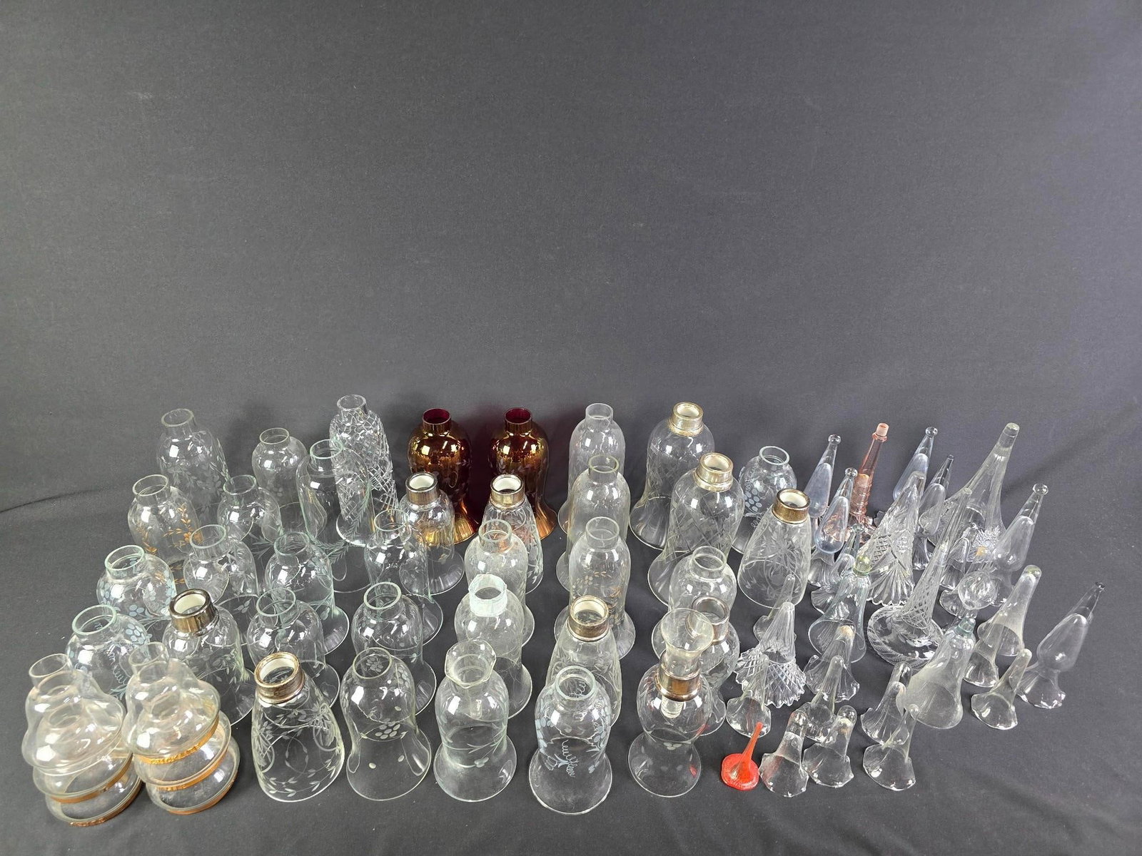 Large Collection of Glass Lamp Shades and Epergne Flutes: NOT ELIGIBLE FOR IN-HOUSE SHIPPING. 3-1/2" to 9" high. Sold as is.