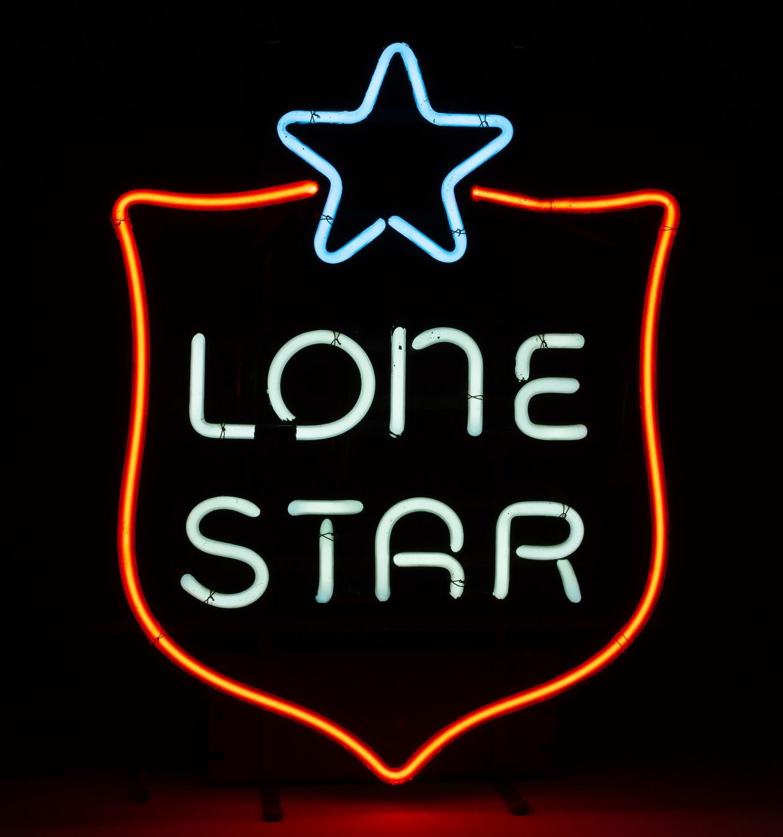 Lone Star Neon Sign: NOT ELIGIBLE FOR IN-HOUSE SHIPPING. Working. Overall: 14-1/2" wide x 6-1/4" deep x 19" high. PROVENANCE: From the Collection of Robert L. Hassenplug—a proud veteran and small business owner was an a