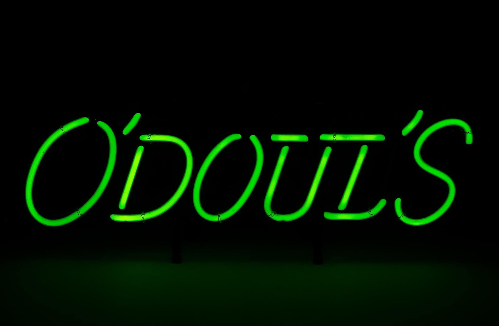 O'DOUL'S Neon Sign: NOT ELIGIBLE FOR IN-HOUSE SHIPPING. Working. Overall: 23-1/2" wide x 5-1/2" deep x 8-1/2" high. PROVENANCE: From the Collection of Robert L. Hassenplug—a proud veteran and small business owner was a