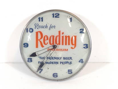 Reading Premium Beer Clock: NOT ELIGIBLE FOR IN-HOUSE SHIPPING. Untested. 15" diameter x 4-1/2" deep. Some cracks and losses to face. PROVENANCE: From the Collection of Robert L. Hassenplug—a proud veteran and small business o