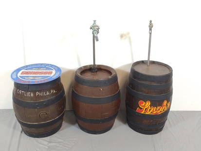 (3) Wooden Beer Kegs incl Genesee: NOT ELIGIBLE FOR IN-HOUSE SHIPPING. 1) wooden beer keg with attached Genesee sign on top not secure to top; 2) (2) wooden beer kegs with brand names on side. CONDITION: overall excellent condition wit