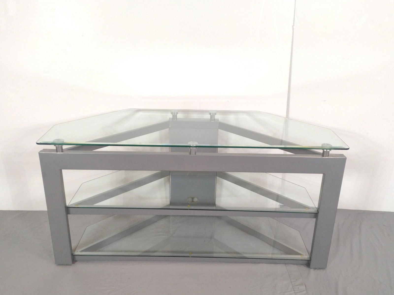 Glass Top TV Stand: NOT ELIGIBLE FOR IN-HOUSE SHIPPING. 48" wide X 19-1/2" deep X 24" high.