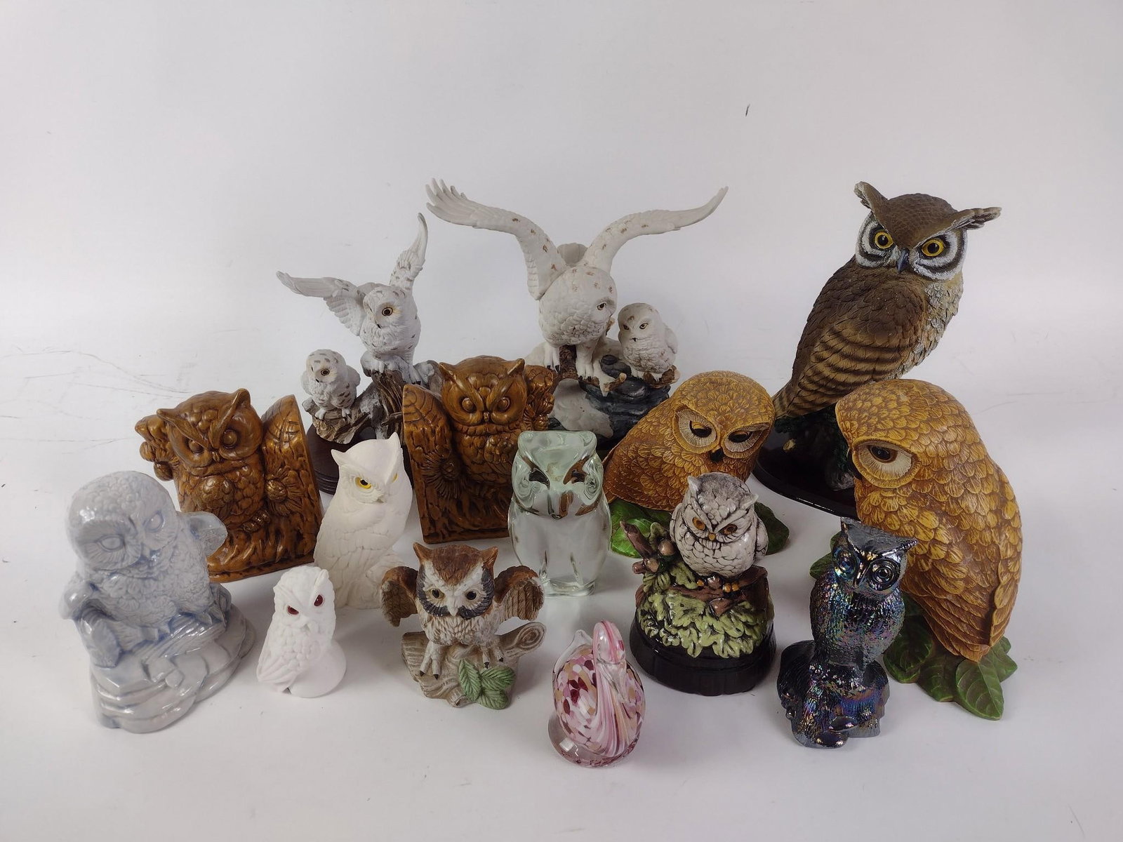 14 Owl Figurines and Duck Paperweight: NOT ELIGIBLE FOR IN-HOUSE SHIPPING. 2-1/2" to 9-1/2" wide and 3-1/2" to 10-1/2" tall.
