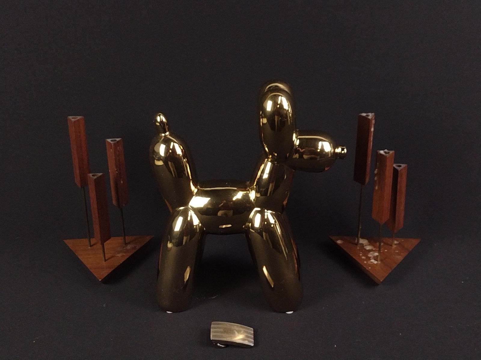 3 Decorative Pieces & Sterling Silver Belt Buckle: Includes balloon animal dog statue; two candle holders. 4-3/4" to 8-3/4" wide x 8" to 10-1/2" high.