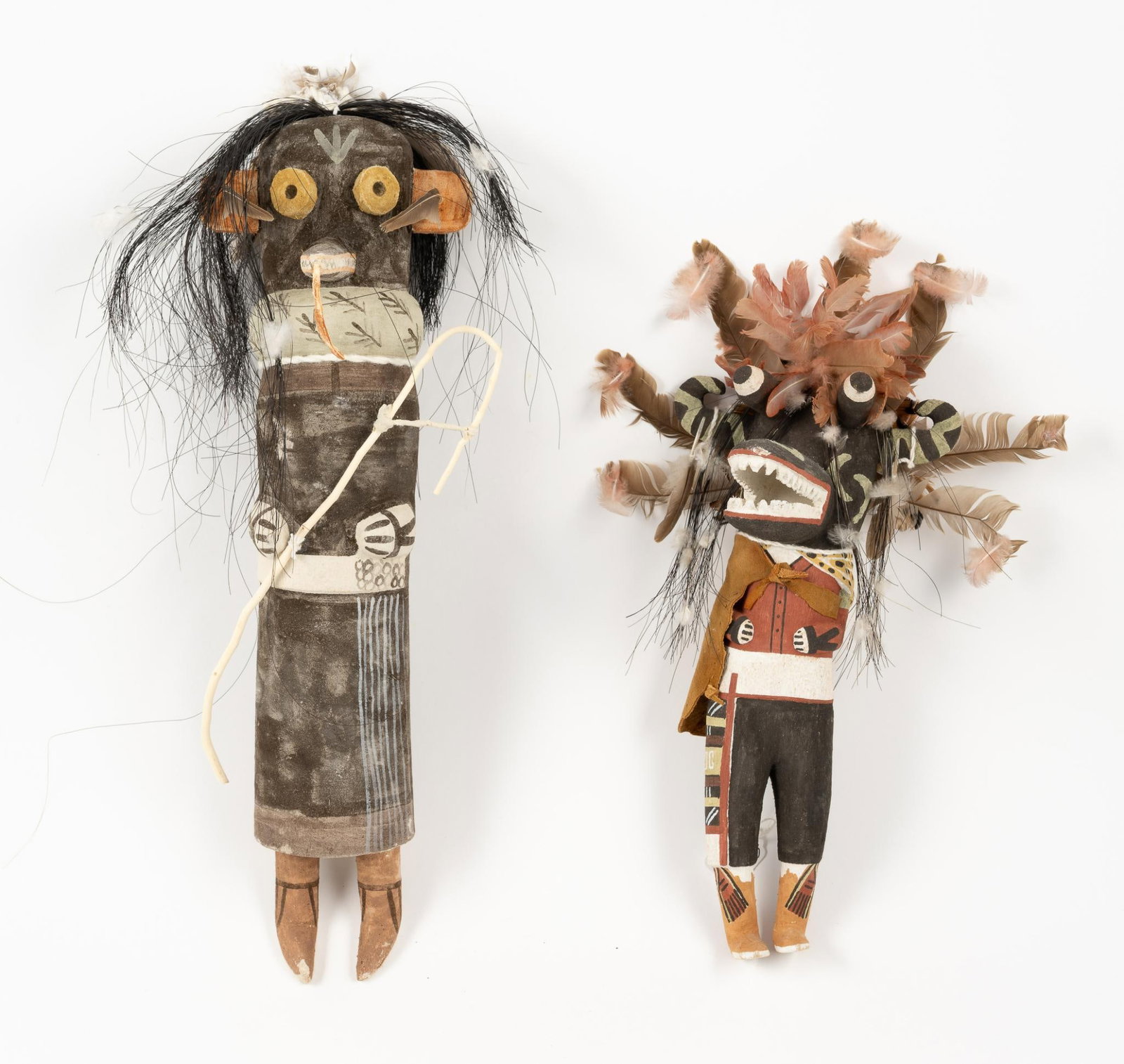 (2) Hopi Old Style Kachinas/Katsinas: NOT ELIGIBLE FOR IN-HOUSE SHIPPING. DESCRIPTION: 1) Nataska carved by Cory Ahownewa; 2) Soyokwuuti carved by Randy Brokeshoulder. Old Style Hopi Kachinas, hand-carved with traditional detail, reflect 