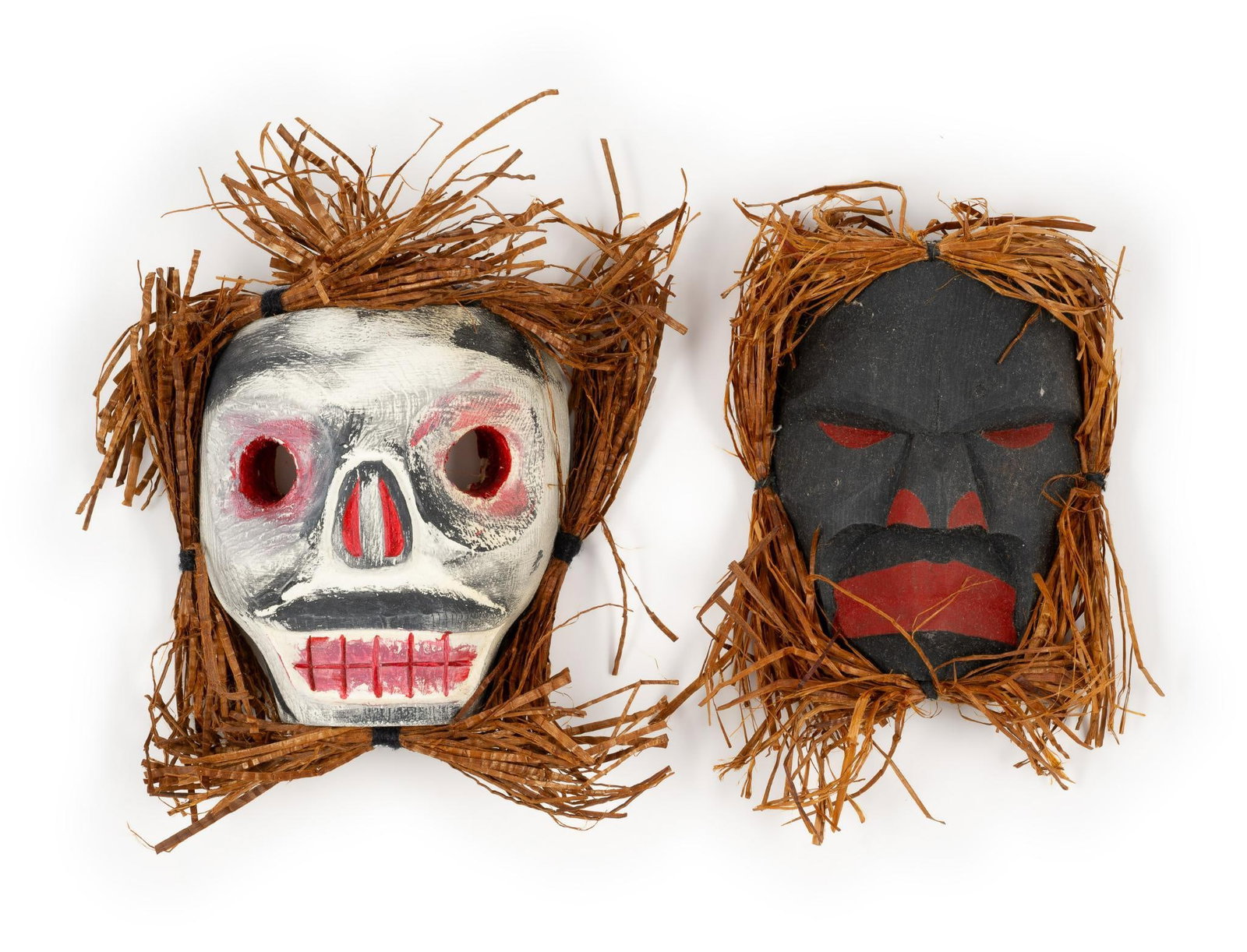 (2) Gilbert Dawson (Kwakwala) Carved Masks: NOT ELIGIBLE FOR IN-HOUSE SHIPPING. DESCRIPTION: Includes two carved Pacific Northwest masks. Gilbert Dawson (1984 -) began carving in 1995. His works emphasize his tribes culture and history. Gilbert