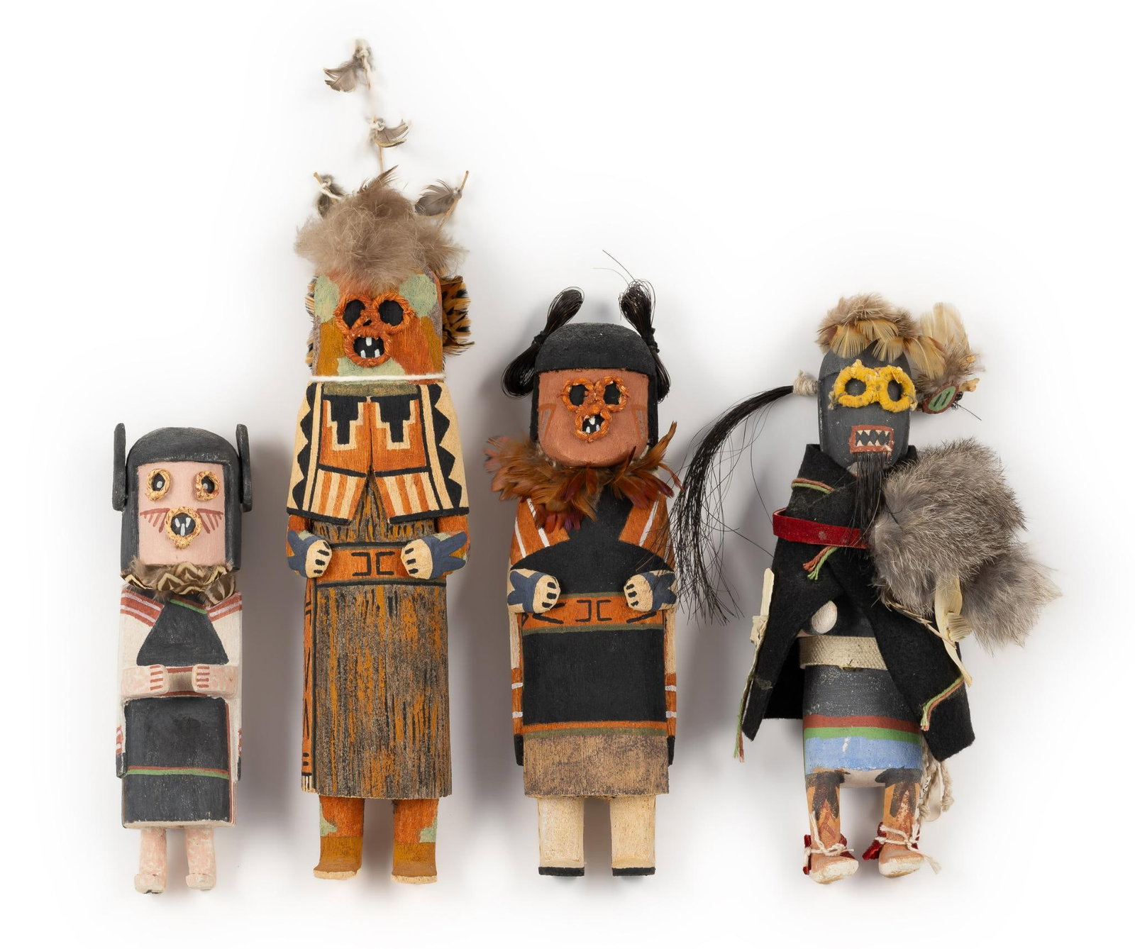 (4) Old Style Hopi Kachinas/Katsina: NOT ELIGIBLE FOR IN-HOUSE SHIPPING. DESCRIPTION: 1) Hettewuti (Warrior Madian) carved by Jarret James; 2) (2) Orges carved with web motif; 3) maiden carved with initials QT. Old Style Hopi Kachinas, h