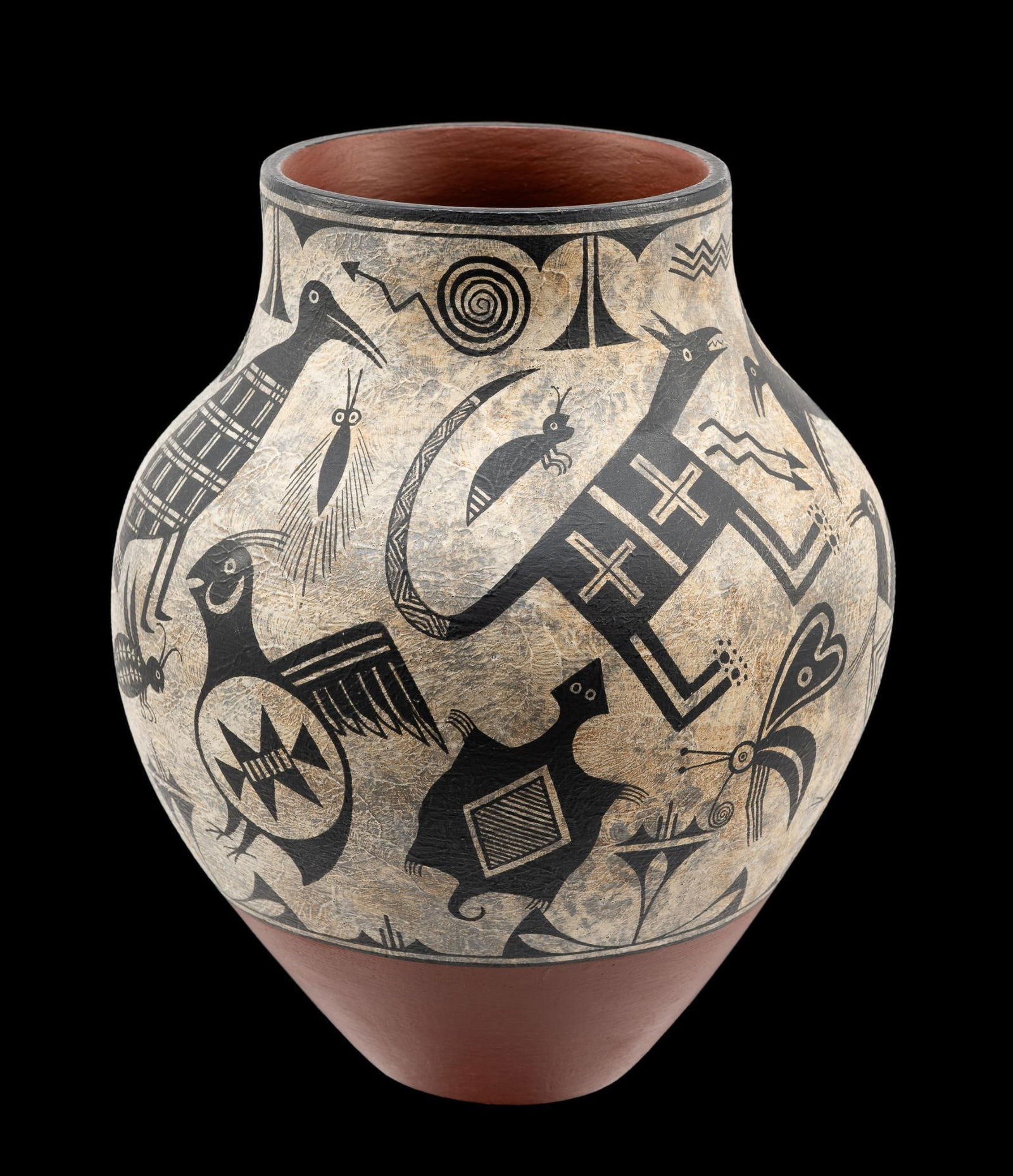 Zia Pueblo Ralph Aragon Pottery Jar: DESCRIPTION: Signed on bottom. Decorated with animal and bugs. Black and white design. MEASUREMENT: 7-1/2" wide x 9-1/2" high.