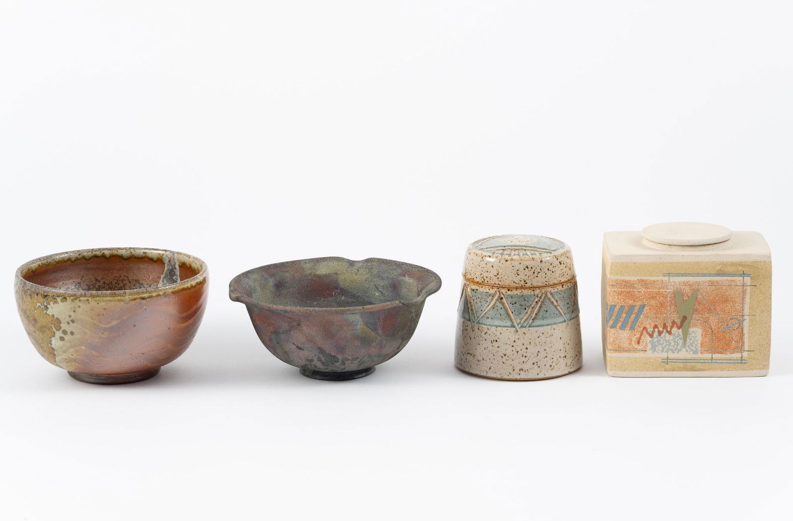 4 Signed Ceramics: Includes 2 bowls and 2 containers. 3-3/4" to 6" wide and 2-3/4" to 3-3/4" tall.
