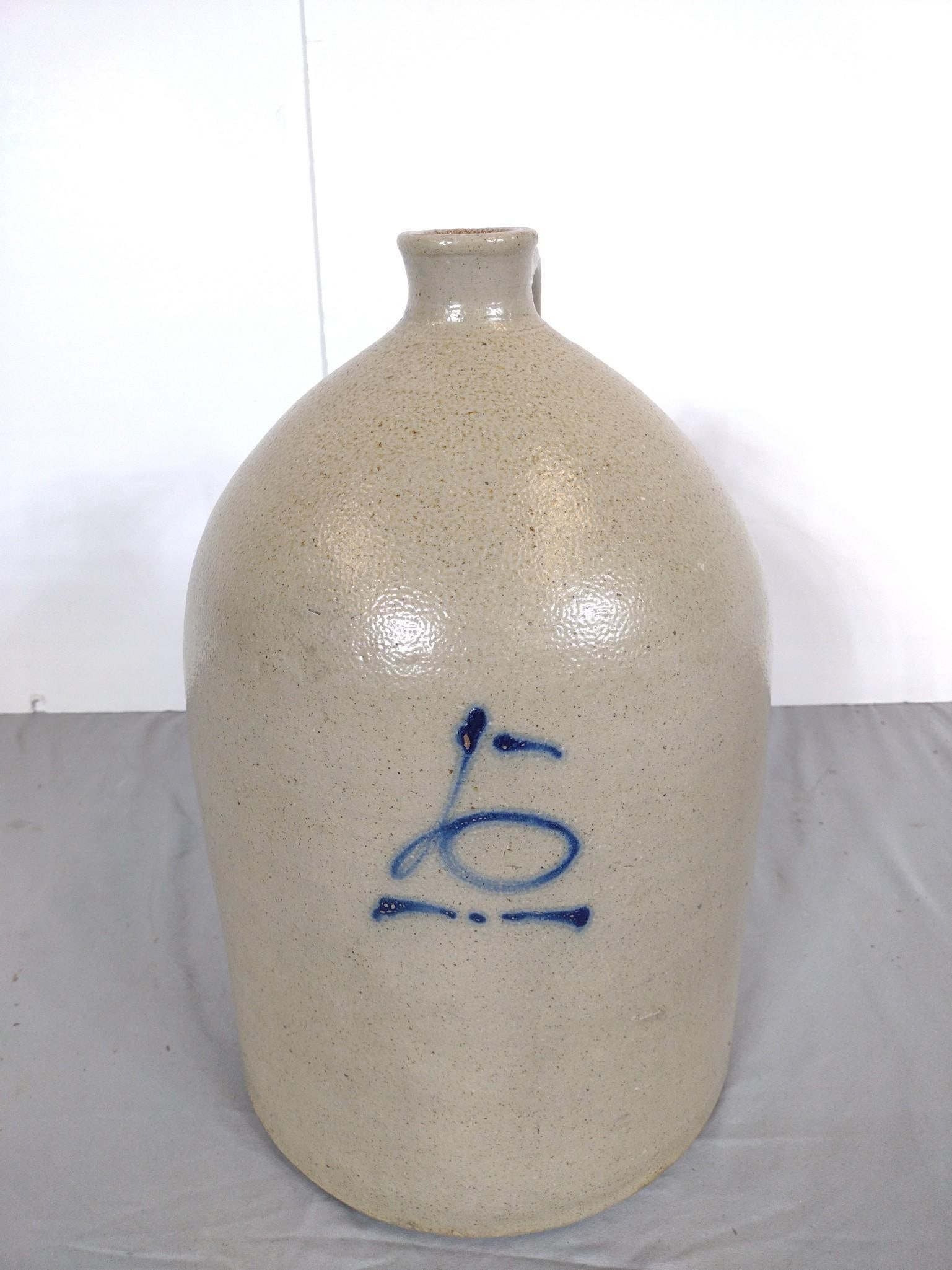 Stoneware Jug: NOT ELIGIBLE FOR IN-HOUSE SHIPPING. 10-1/2" to 17" high.
