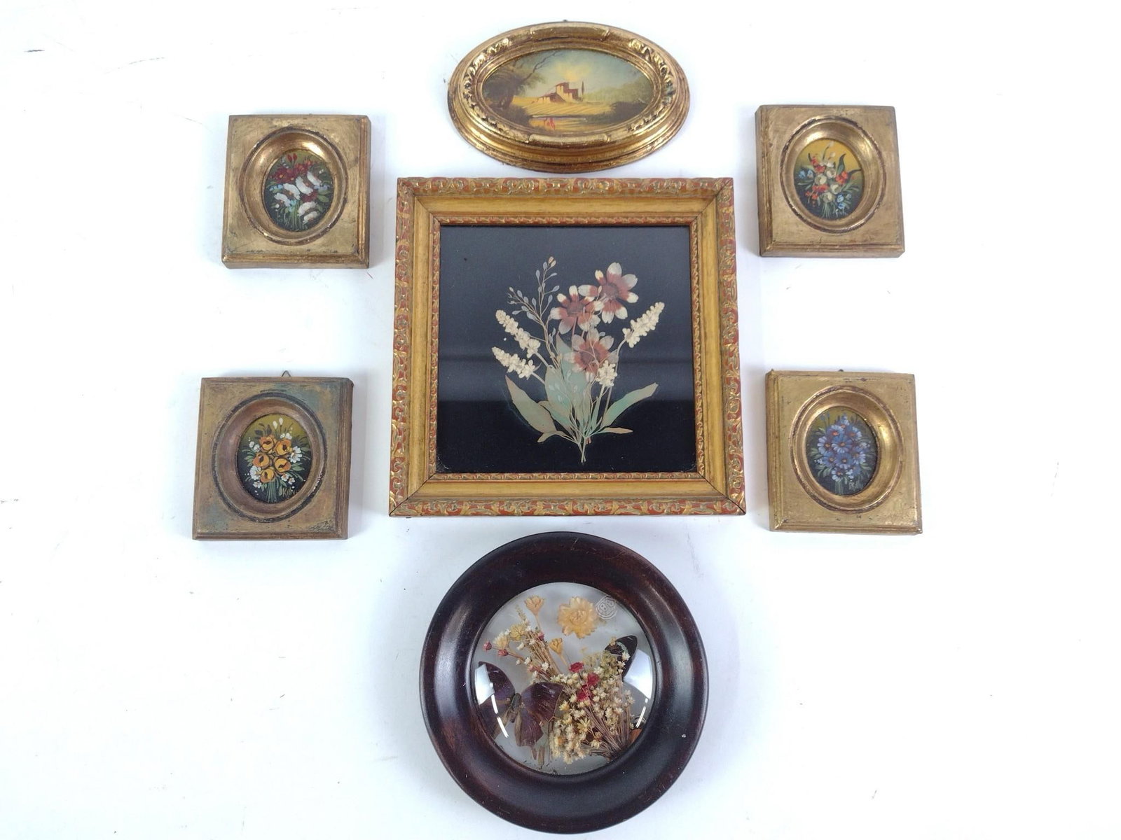 5 Miniature Framed Paintings and 2 Frames with Preserved Flowers: NOT ELIGIBLE FOR IN-HOUSE SHIPPING. Smallest is 3-1/2" by 4" and largest is 8-1/4" by 8-1/4"