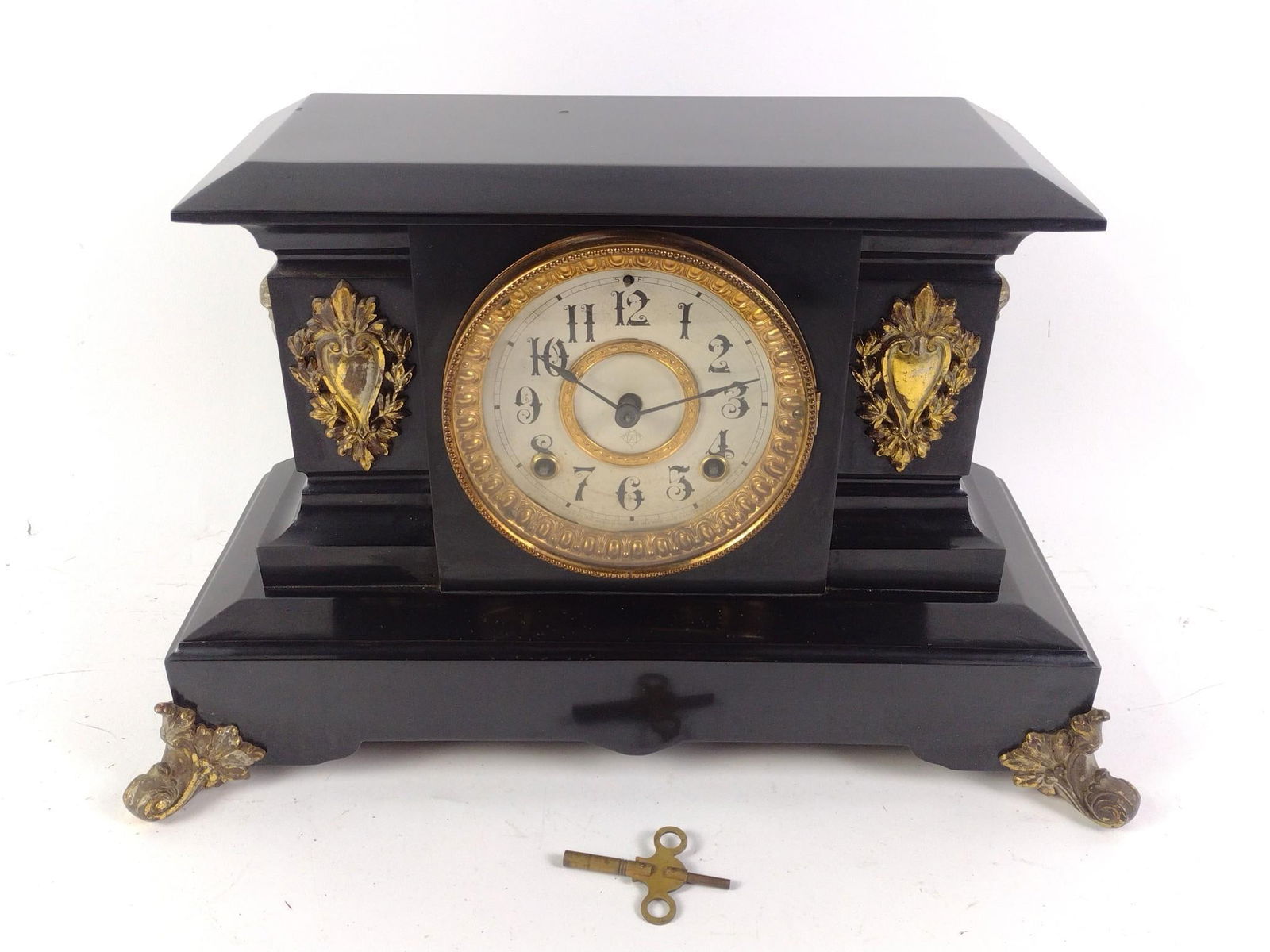 Ansonia Mantle Clock: 15-1/4" wide x 10-1/4" high.