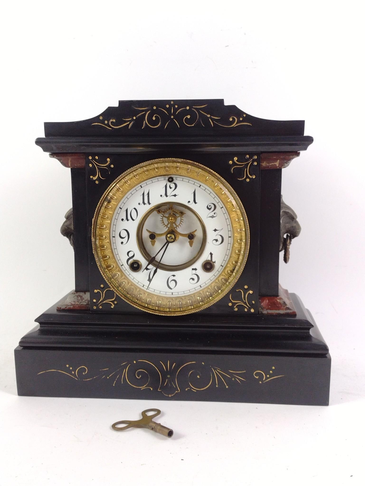 Ansonia Mantle Clock: With key. 11-1/2" wide x 10-3/4" high. Not running.