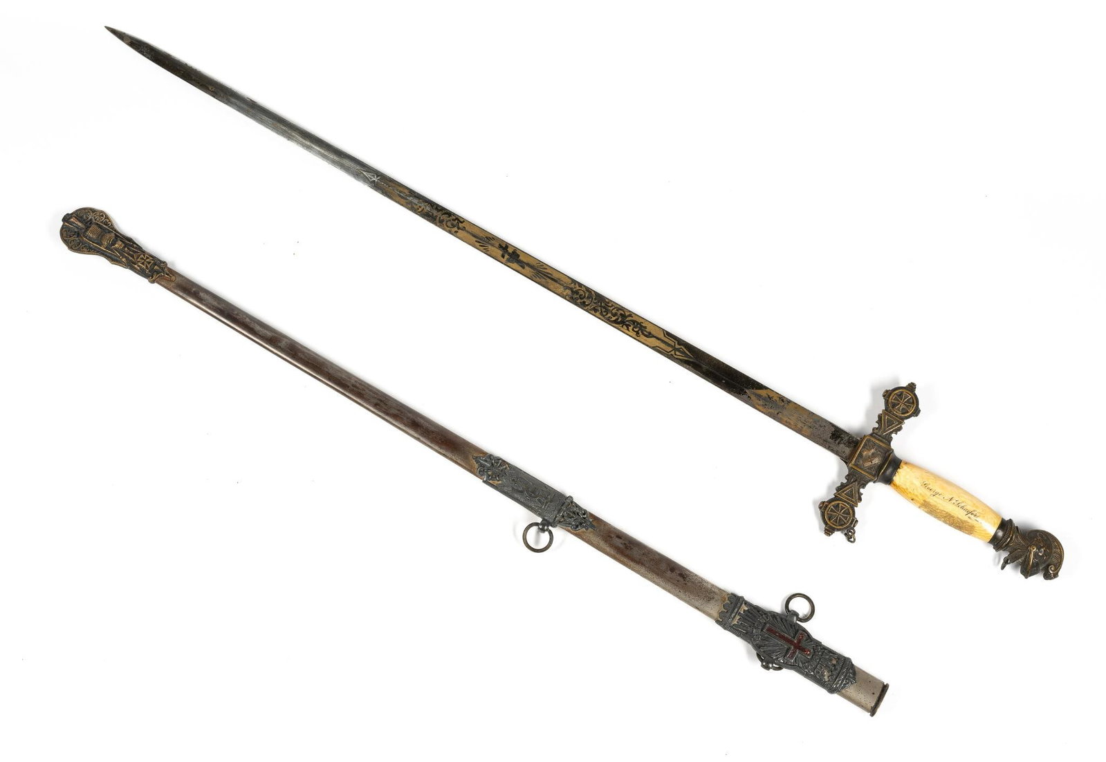 Masonic Sword: NOT ELIGIBLE FOR IN-HOUSE SHIPPING. Masonic sword, made for George N. Schaefer. Dimensions: 36-1/2" long, and 5-1/2" wide at hilt.