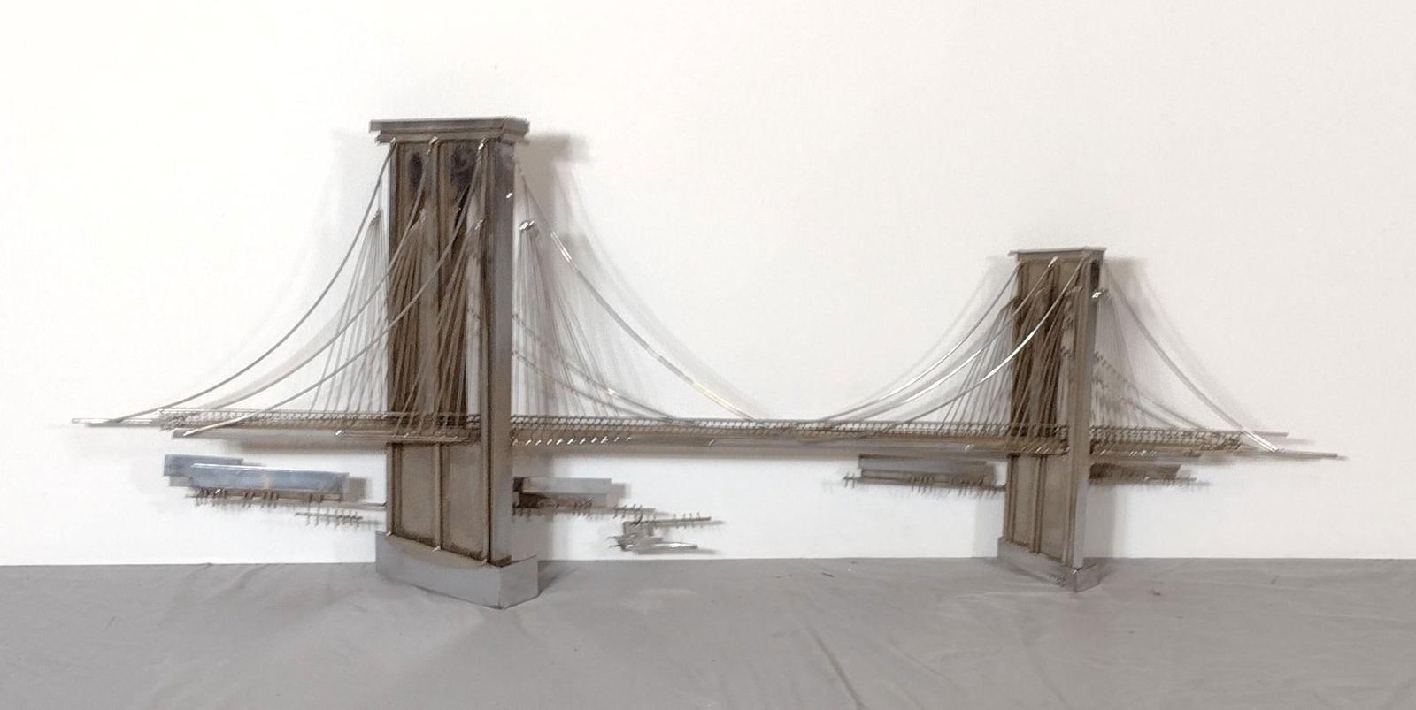 Brutalist Bridge Wall Sculpture by Curtis Jere, 1976: NOT ELIGIBLE FOR IN-HOUSE SHIPPING. Approx 68" wide, 22" tall, and 5" deep.