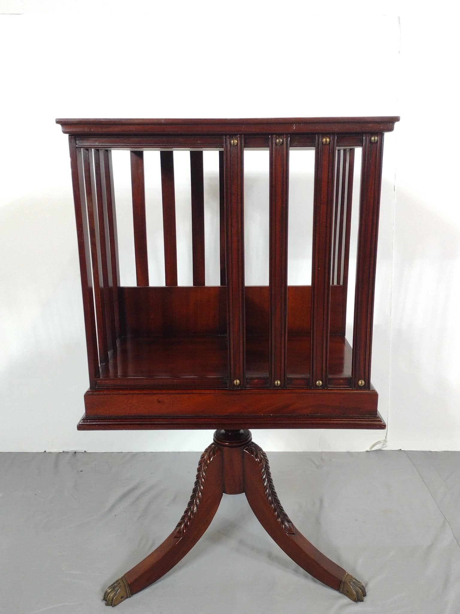 Leather Top Revolving Bookcase: NOT ELIGIBLE FOR IN-HOUSE SHIPPING. 19-1/4" wide X 19-1/4" deep X 36" high. No manufactures name found.