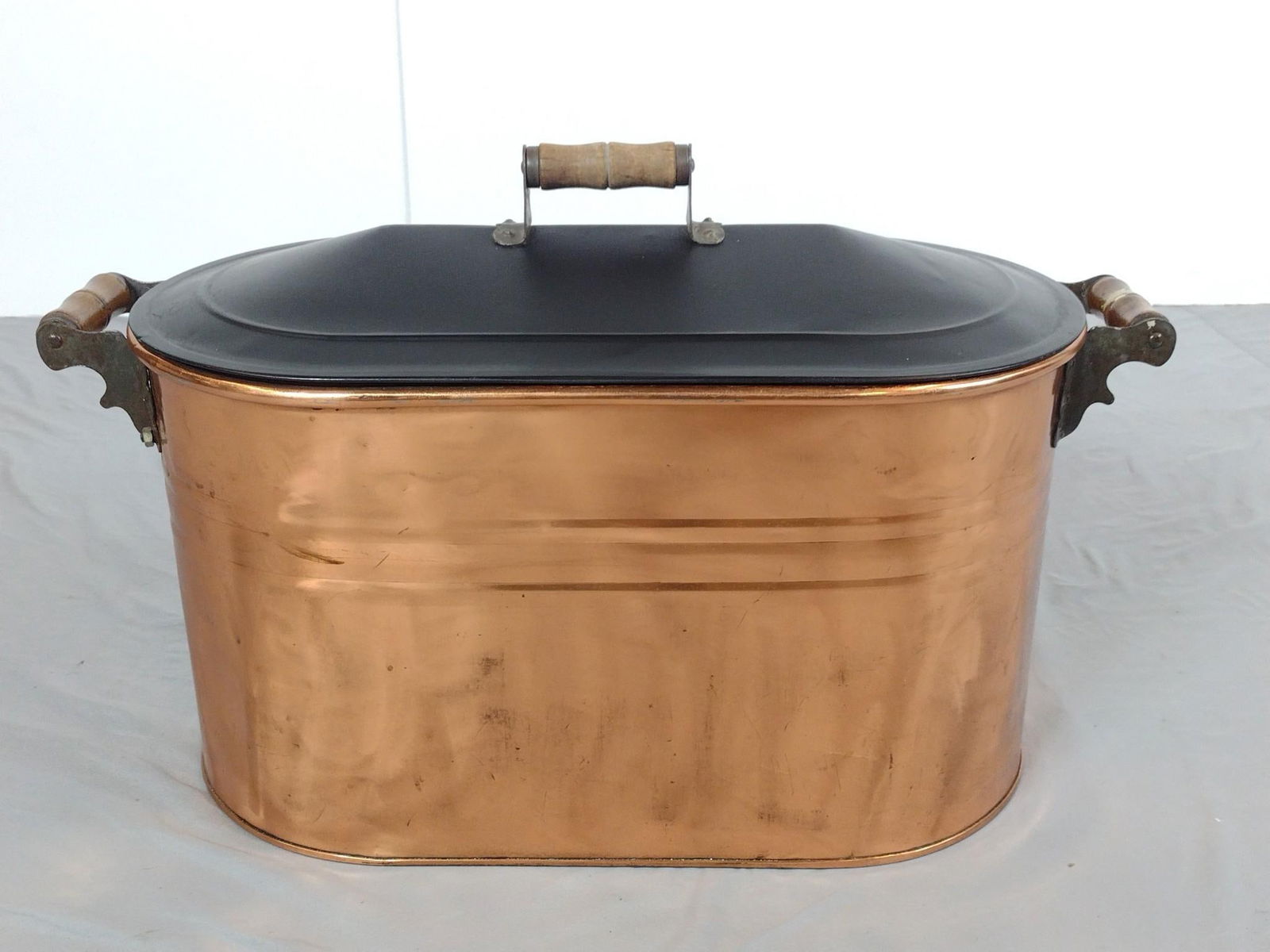 Copper Boiler: NOT ELIGIBLE FOR IN-HOUSE SHIPPING. 27-1/2" wide X 12-1/2" deep X 18" high. Has some dents and scratches.