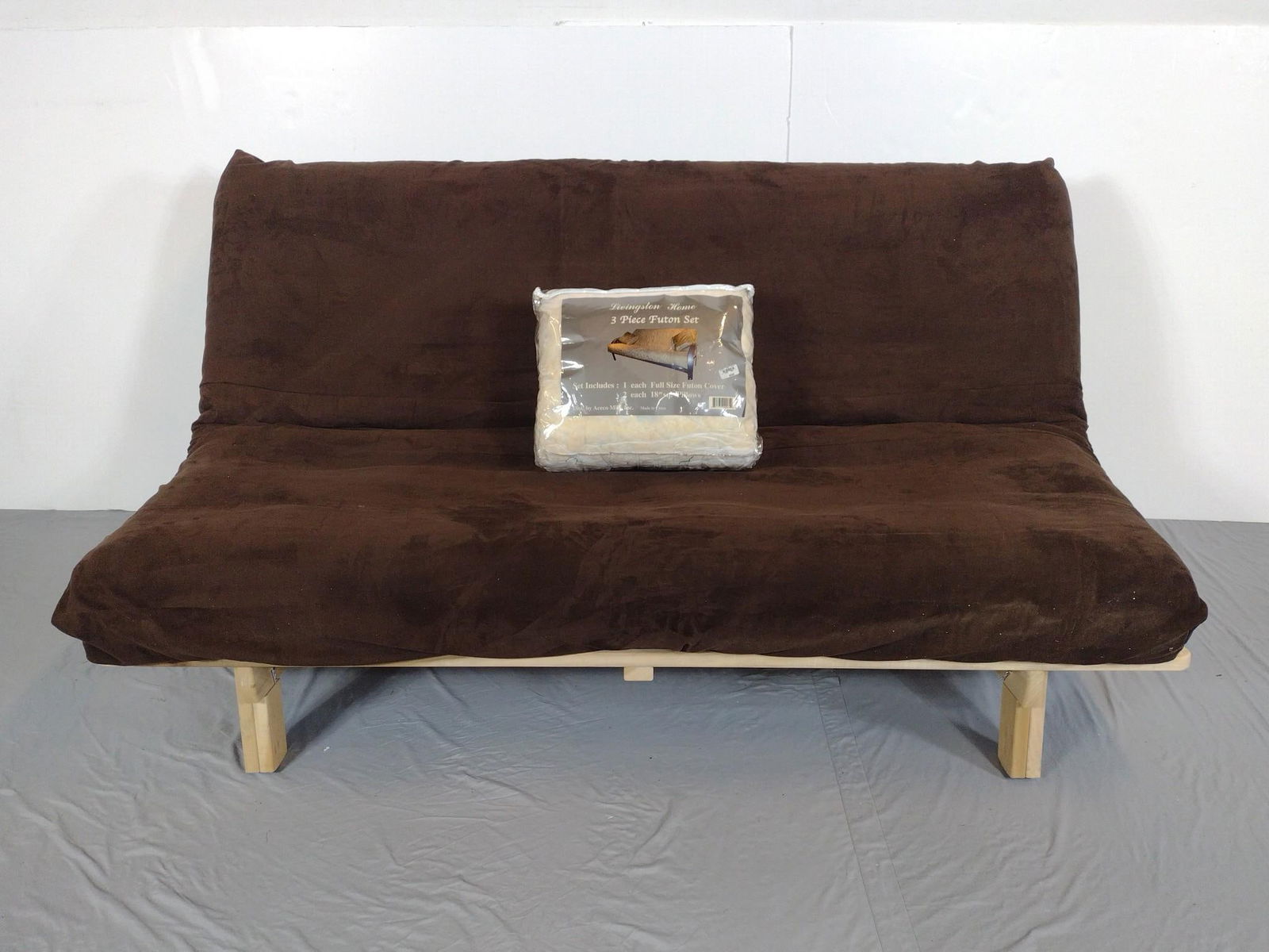 Futon: NOT ELIGIBLE FOR IN-HOUSE SHIPPING. 73" wide X 42" deep X 37" high. Includes new cover.