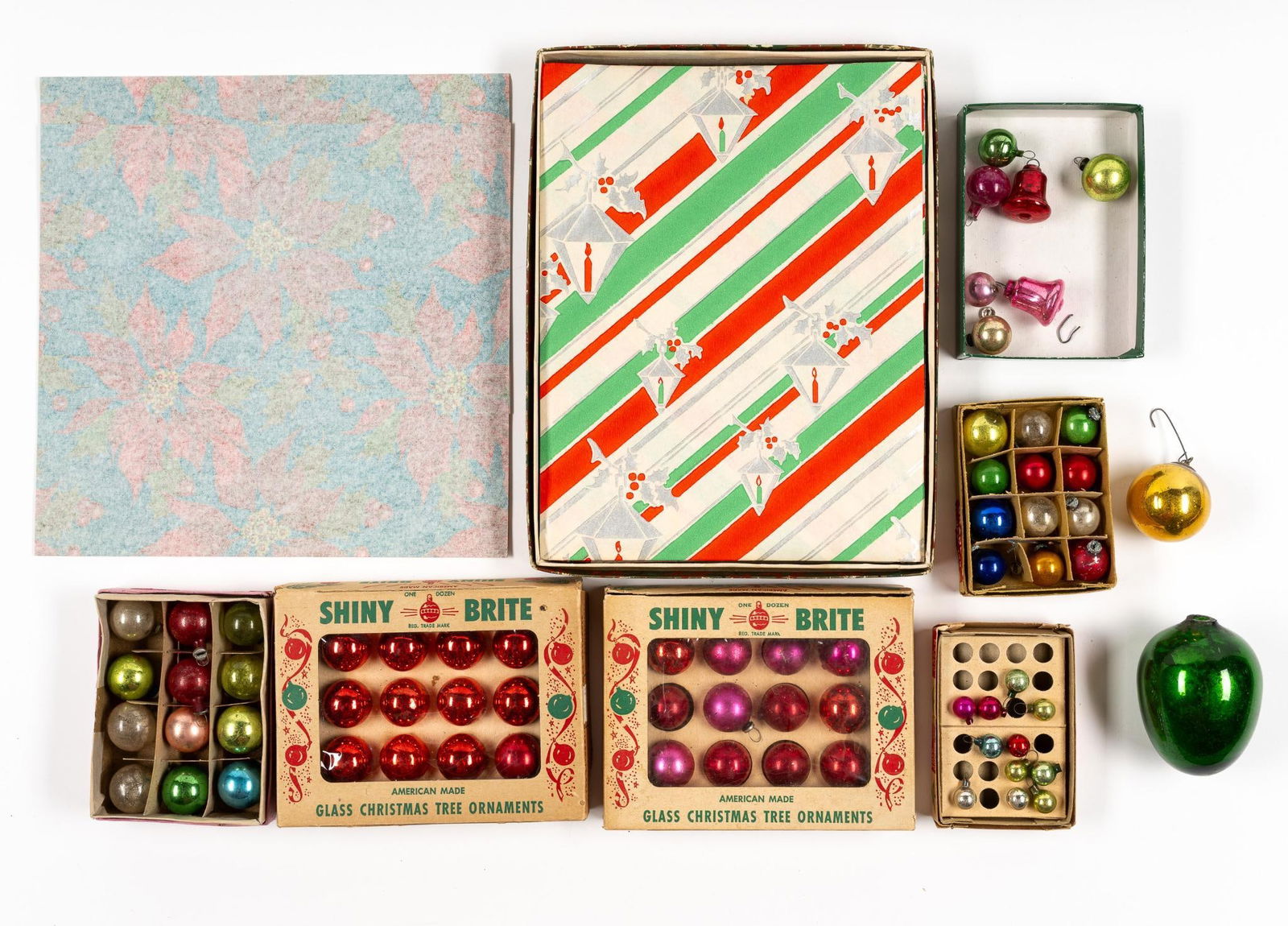 Antique Christmas Ornaments And Wrapping Paper: NOT ELIGIBLE FOR IN-HOUSE SHIPPING - See Terms for Shipping Options. Folded vintage wrapping paper. Shiny Brite ornaments and other small antique ornament balls plus a larger Goebel missing the metal