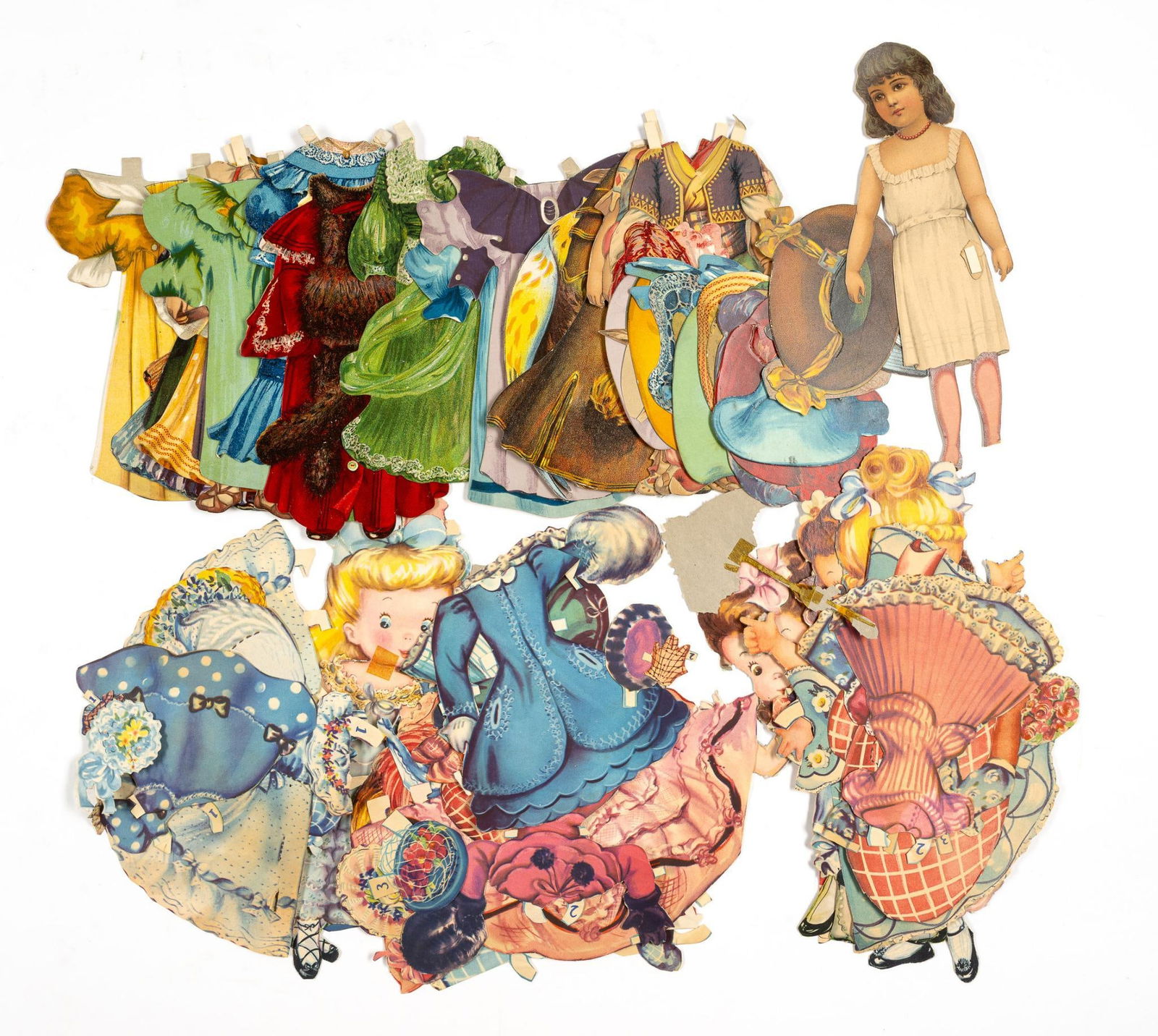 2 Paper Dress-Up Doll Sets: Includes 2 paper dress up doll sets.