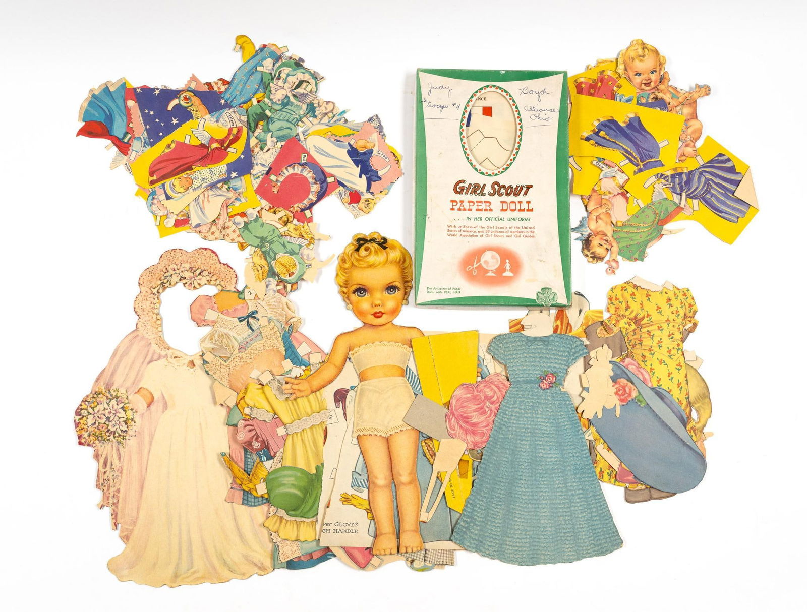 2 Paper Dress-Up Doll Sets: Includes a Girl Scout paper dress-up doll.