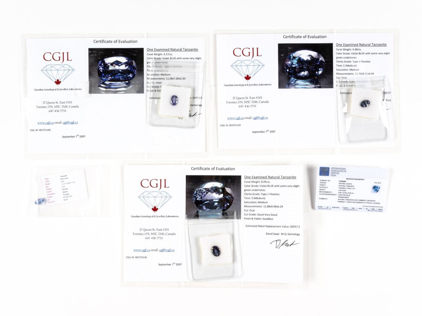 Four Unmounted Tanzanite Gemstones with Reports (1 of 2)