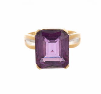 14K Gold & Amethyst Ring: A size 9 yellow gold ring with a central faceted amethyst. The ring is in new condition and weighs 6.0 grams.