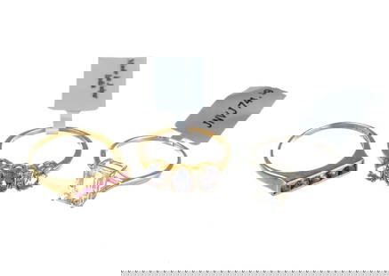 Three 14K And 10K Gold Gemstone Rings: All three rings are size 9. One 10k yellow gold with tanzanite and small diamonds, one ring with channel set rubies is 14k yellow gold, and the third is 10k white gold with aquamarine. The weight of