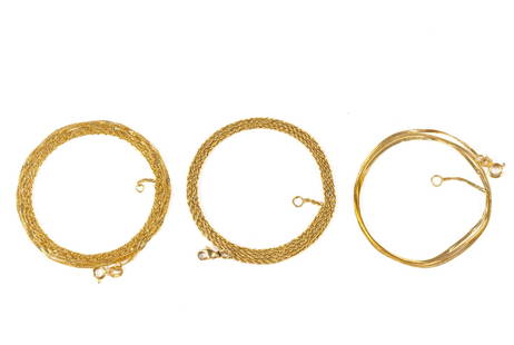 Three 14K Gold Chain Necklaces: Three yellow gold chain necklaces 16", 18", 30". The 16" herringbone piece has some crimping damage. Total weight is 6.2 grams.