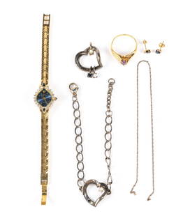 Jewelry Lot With 14K Gold: A size 9 ring with marquise amethyst and small accent diamonds weighing 3/7 grams. A pair of 10K onyx and diamond studs weighing 0.4 grams. A Jules Jurgensen quartz watch, not running and may need a