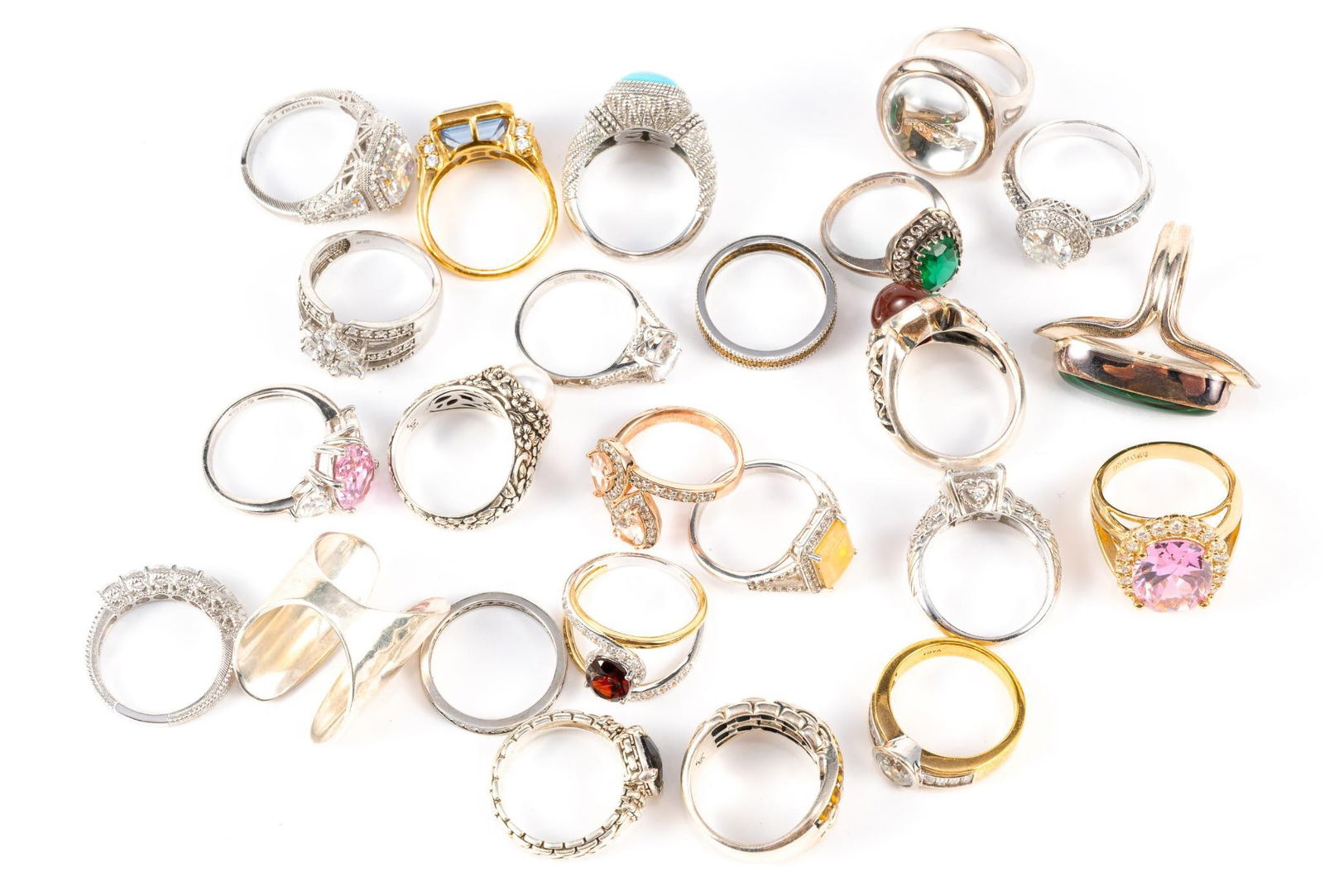 24 Sterling Silver Rings: Most of the rings are size 9 with a few smaller. Total weight is 6.1 troy ounces.