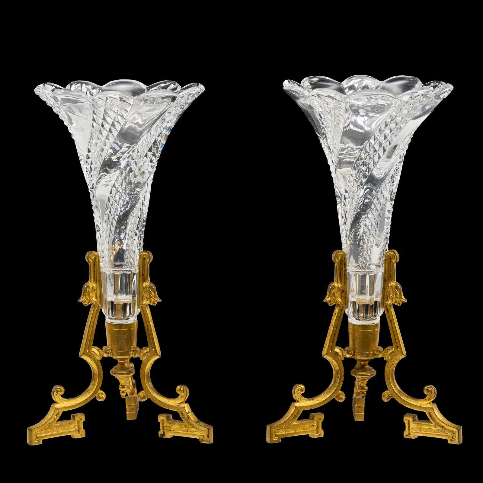 Pair of Antique Crystal and Bronze Vases: NOT ELIGIBLE FOR IN-HOUSE SHIPPING - See Terms for Shipping Options. No mark on crystal. Bronze mounts on bottom of crystal vase. Both measure 6" wide x 12-1/4" high.