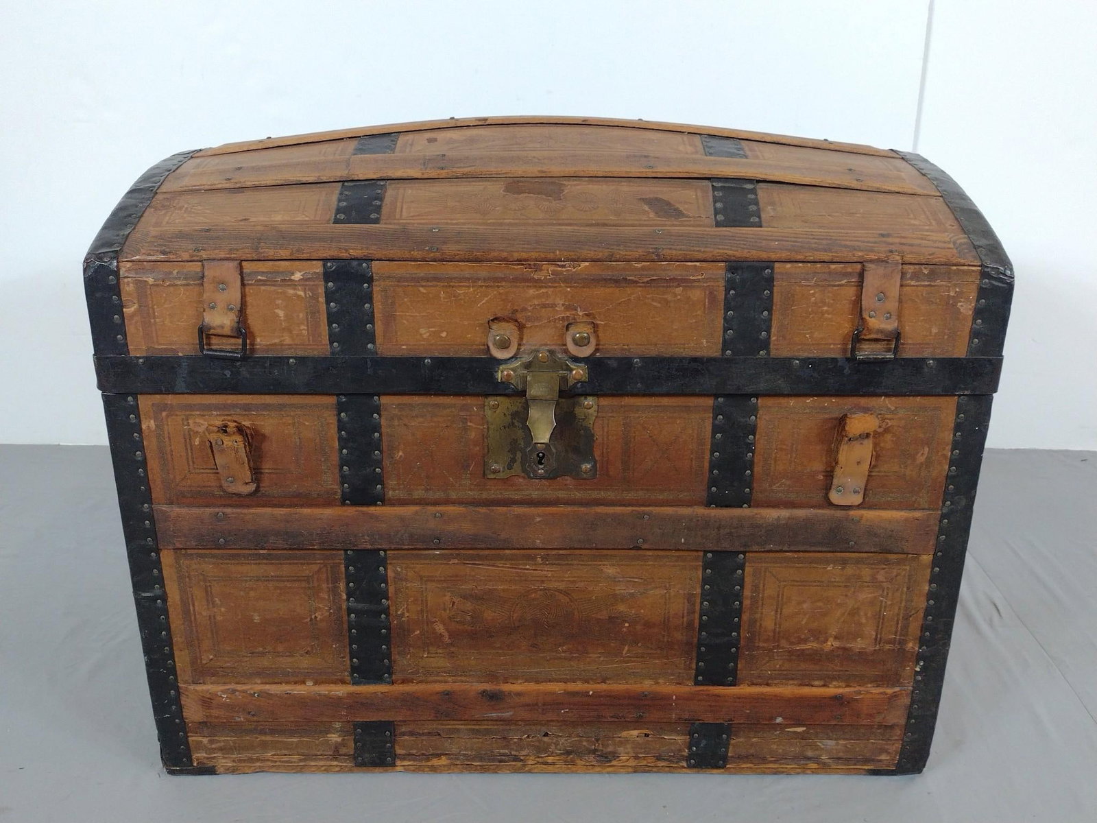 Antique Steamer Trunk: NOT ELIGIBLE FOR IN-HOUSE SHIPPING - See Terms for Shipping Options. Marked "H. Fred Wiltsie" (Newburgh, NY). 30" wide X 19-1/4" deep X 24" high. Has wear consistent with age.