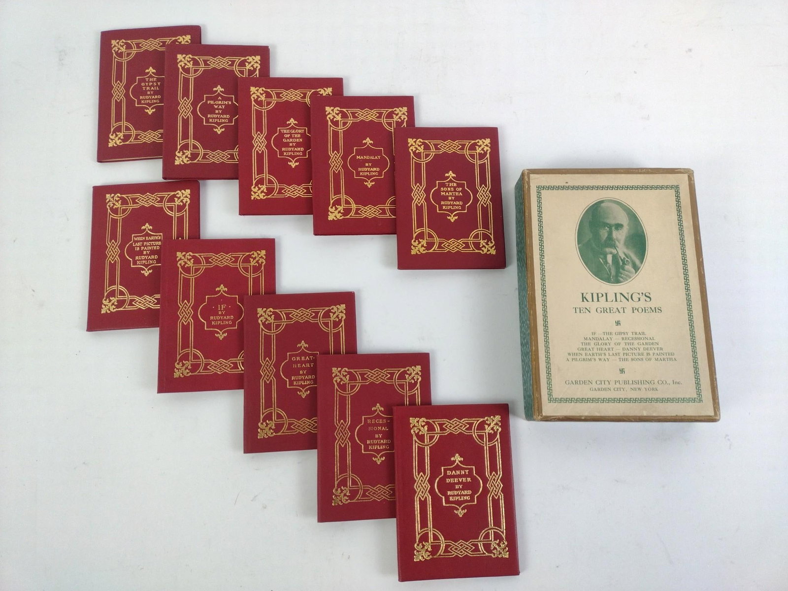 Kipling Ten Great Poems Miniature Books c. 1921: Good condition, with some wear and tear associated with age. 5" wide, 7" tall, and 1-1/2" thick.