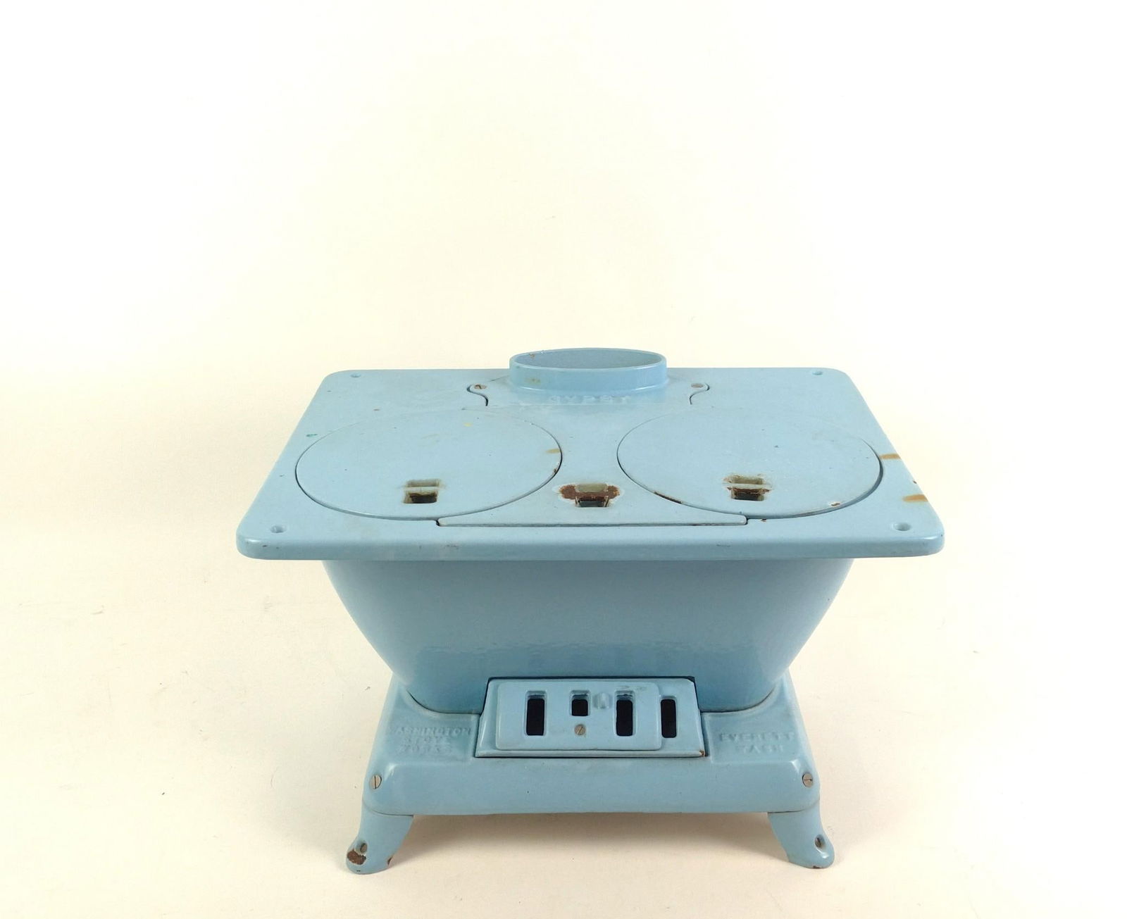 Washington Stove Works Boat Cookstove c. 1950s: NOT ELIGIBLE FOR IN-HOUSE SHIPPING - See Terms for Shipping Options. Light blue boat cookstove c 1950s, never used. Manufactured by Washington Stove Works. Wear and tear associated with age. Dimension