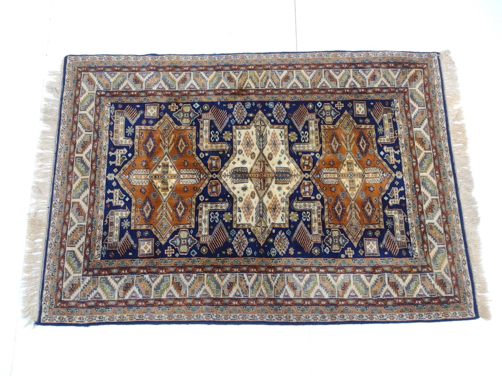 Area Rug: NOT ELIGIBLE FOR IN-HOUSE SHIPPING - See Terms for Shipping Options. 6' long X 4'2" wide. No manufactures name found.
