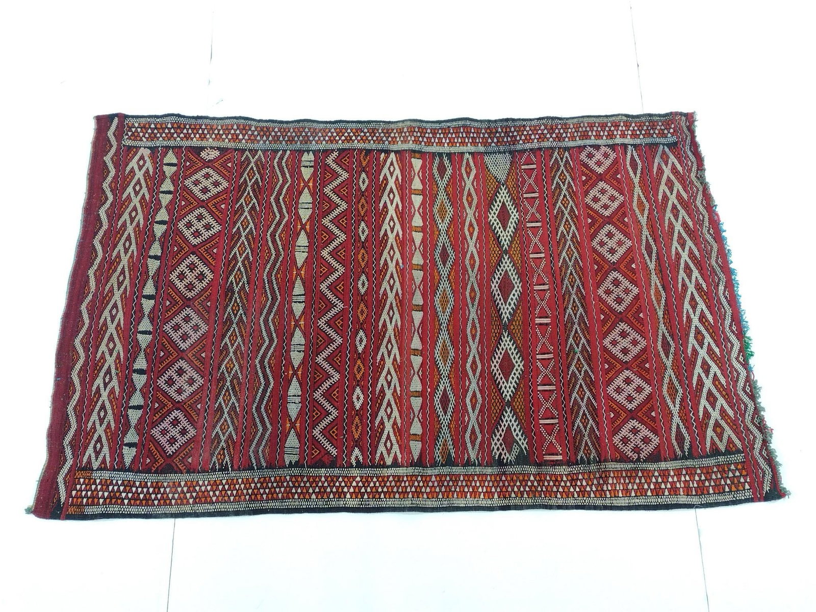 Moroccan Rug: NOT ELIGIBLE FOR IN-HOUSE SHIPPING - See Terms for Shipping Options. Wool. 5'9" long X 3'6" wide.