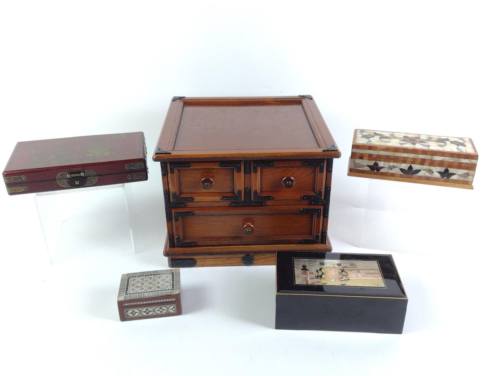 Japanese Tansu Chest and 4 Jewelry Boxes: All in good condition. Tansu chest is 9-1/2" tall, 12-1/2" wide, and 12-1/2" long. Smaller boxes are from 4" to 9-1/2" long and 2" to 2-3/4" tall.