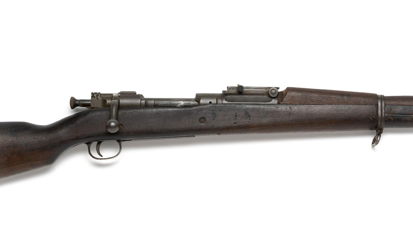 US Springfield Armory Model 1903 .30-06 Rifle: A bolt-action Springfield 1903 rifle from the first year of production. The barrel is stamped S A 3- 17, with the shell and flame inspection symbol from the U. S. Army Ordinance Corps, and the letter