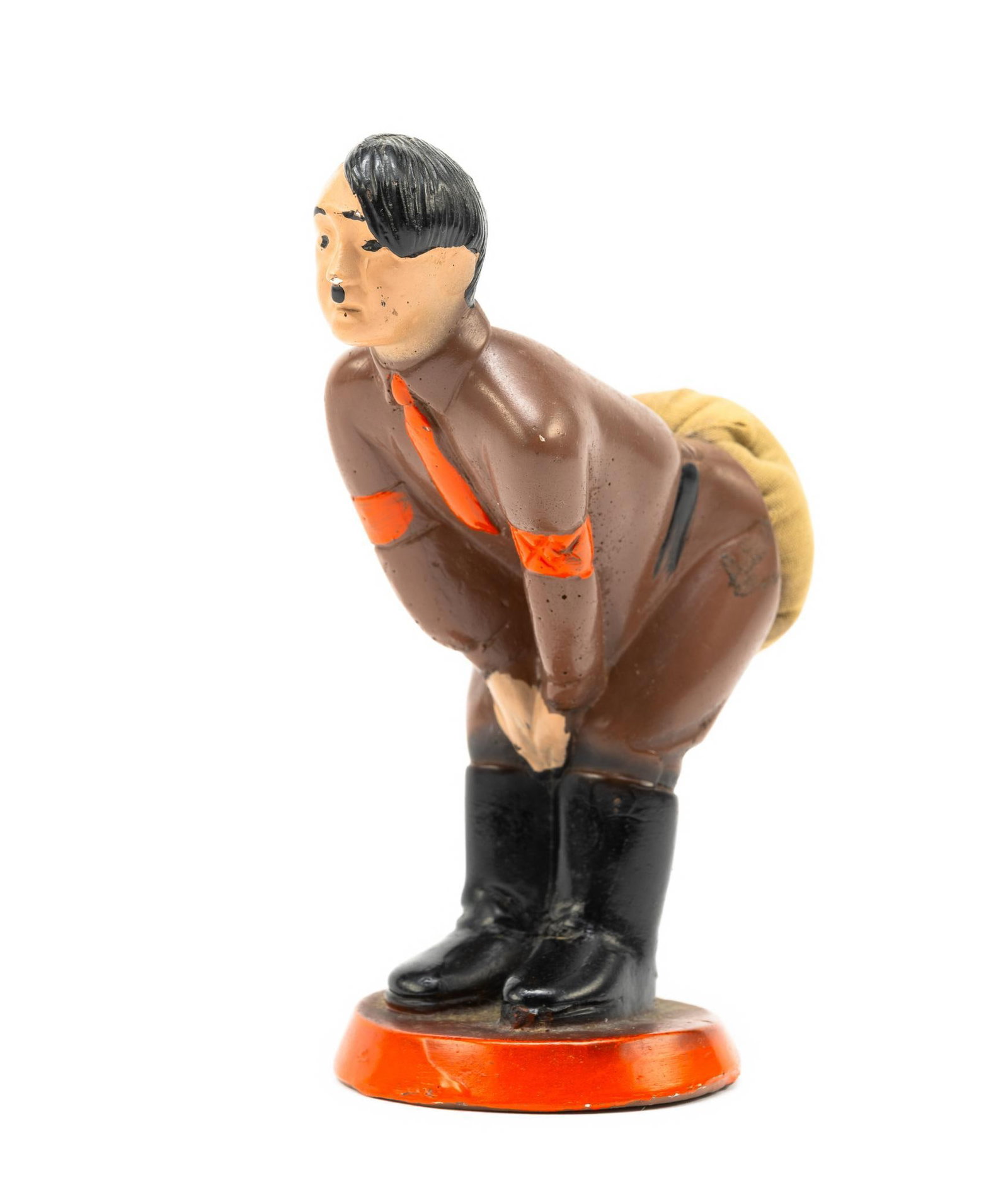 WWII Adolf Hitler Pin Cushion: Made during World War II to help raise money for the war effort. During World War II, novelty anti-Axis items were popular. Many represented Hitler, Mussolini, and Tojo and sold for less than a dollar