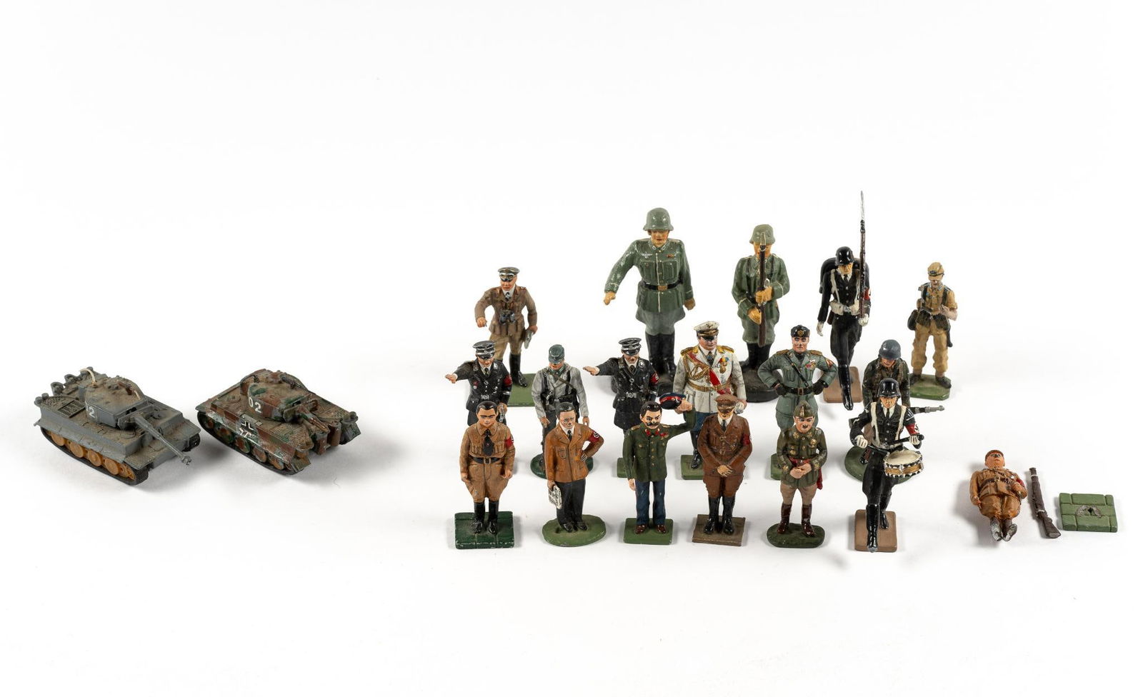 18 Cast Metal Soldiers & 2 Toy Tanks: Includes German and Soviet soldiers. Two damaged. Paint loss overall. 2-1/8" to 3-1/8" high.